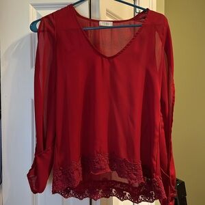 Tobi long sleeve top with open sleeves and lace on bottom